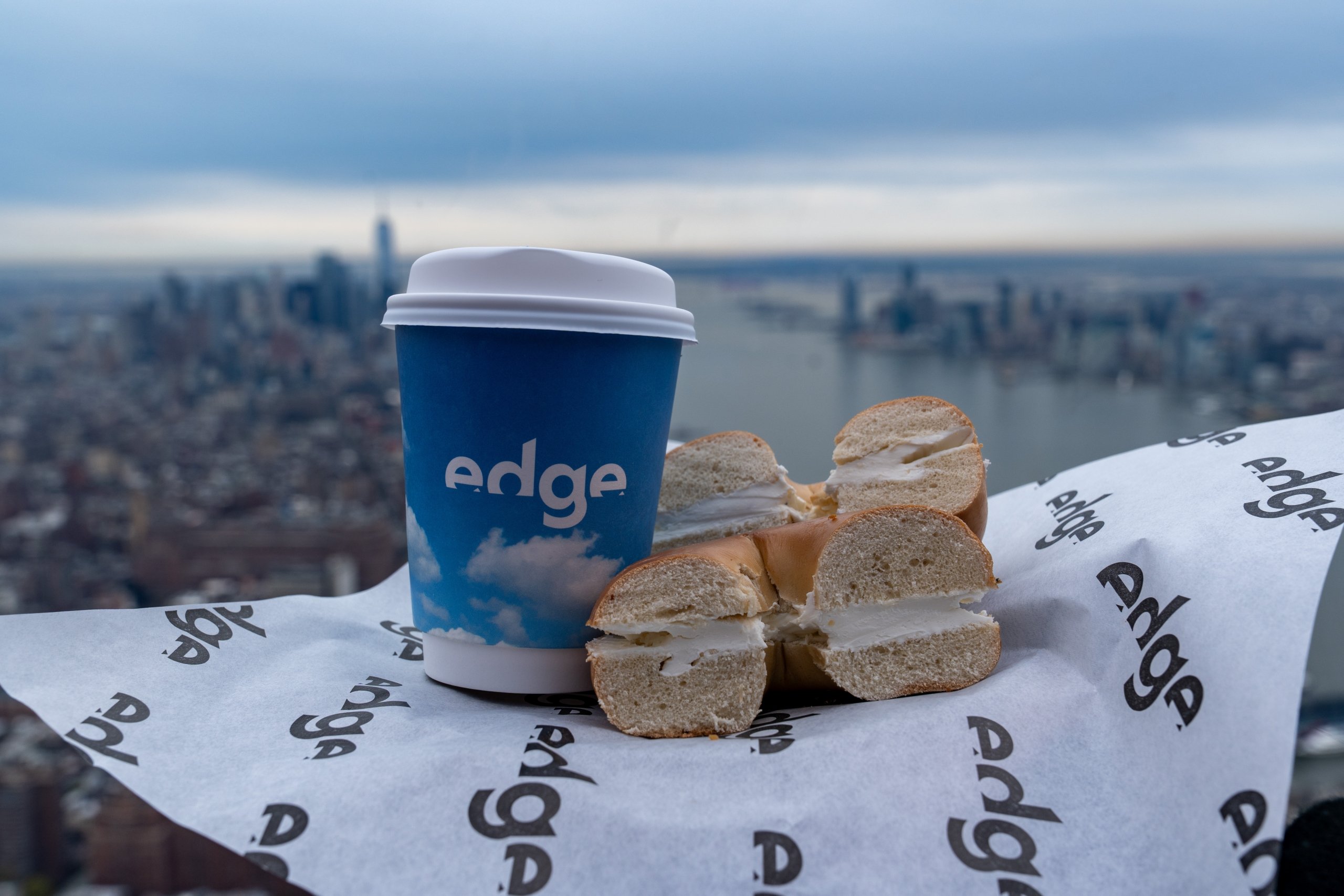 A coffee and bagel with cream cheese from The Edge