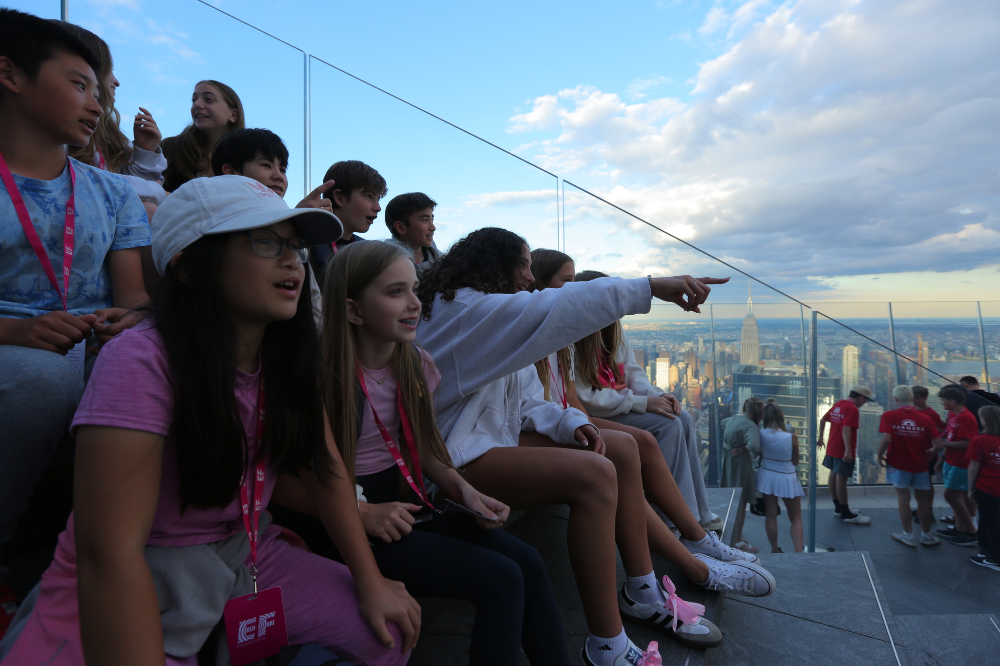Group of kids on the Edge steps overlooking the city views