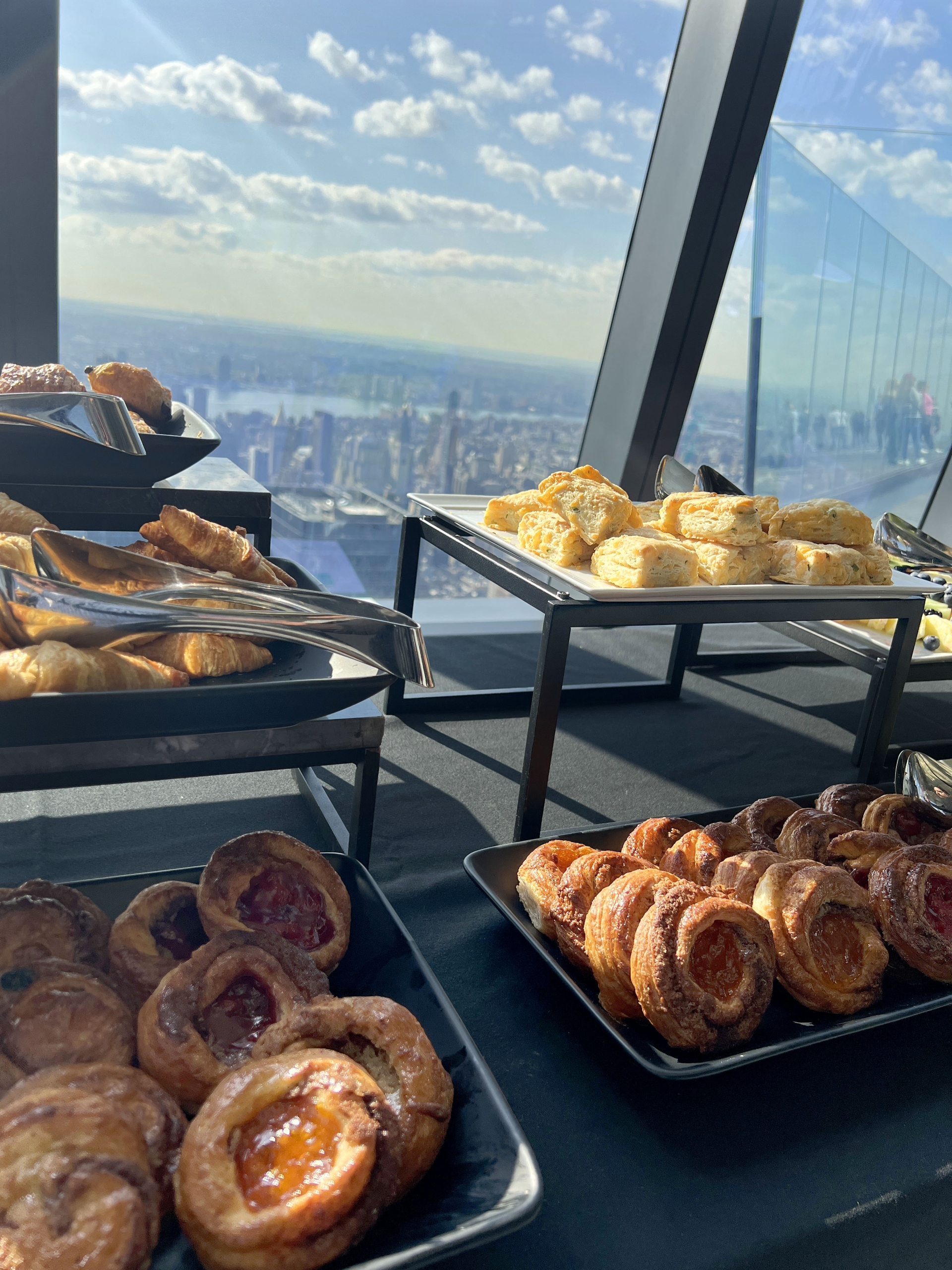 A spread of pasties for breakfast at The Edge overlooking New York city on a sunny morning