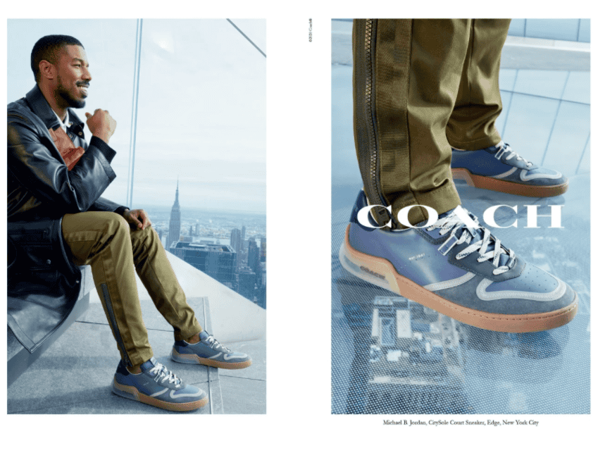 Michael B. Jordan posing outside the Edge NYC with Coach attire
