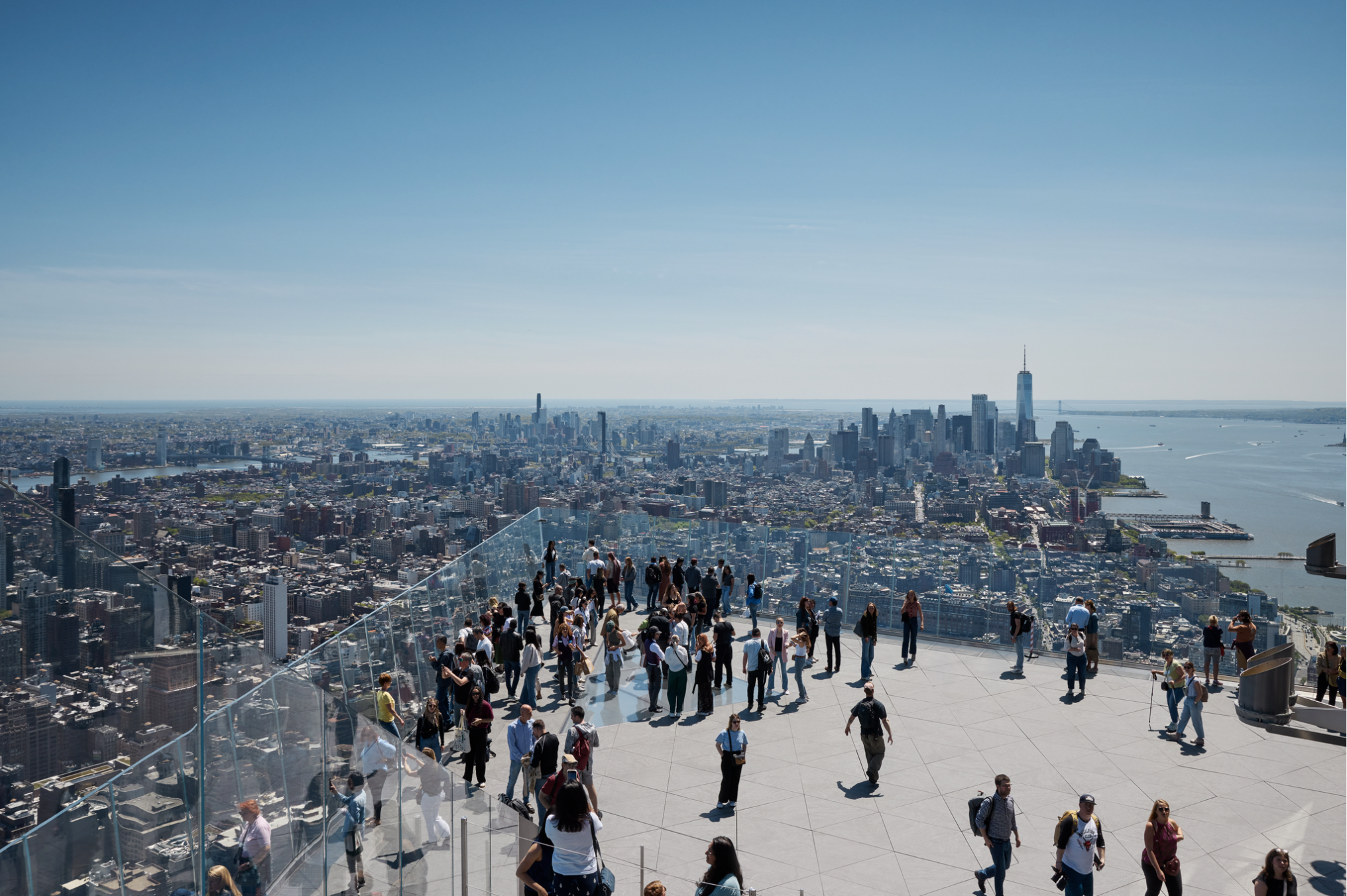a group of people looking at NYC skyline during the day from The Edge NYC