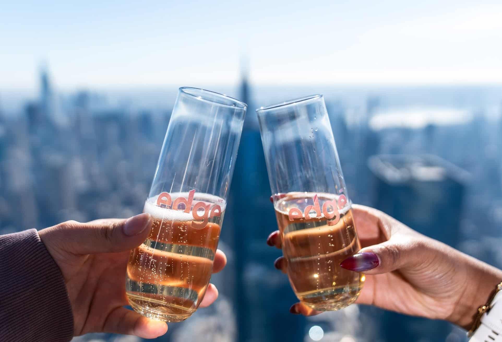 to hands cheering with the edge nyc glasses