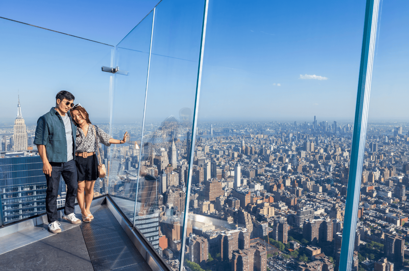 a couple hugging looking out at The Edge NYC