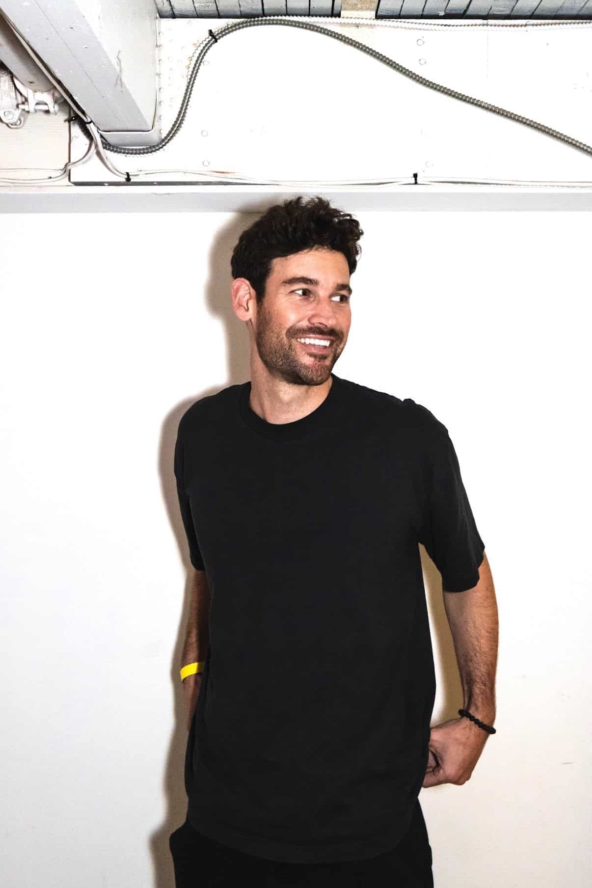 Vandelux posing with a smile press