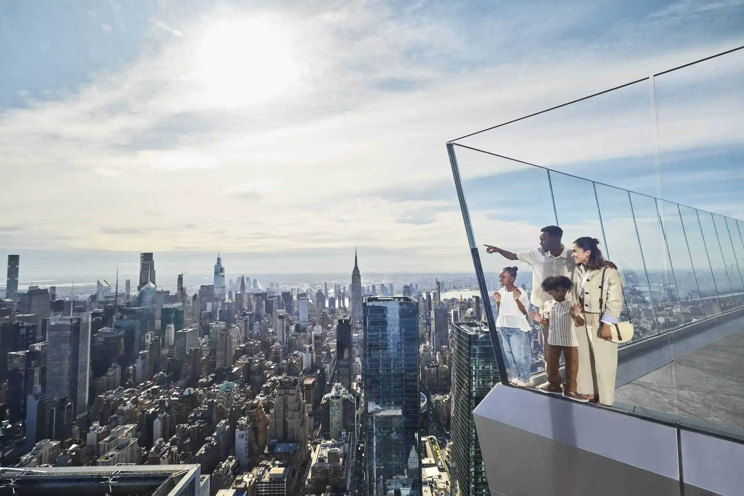 Visitors enjoy panoramic views from Edge NYC sky deck at Hudson Yards.