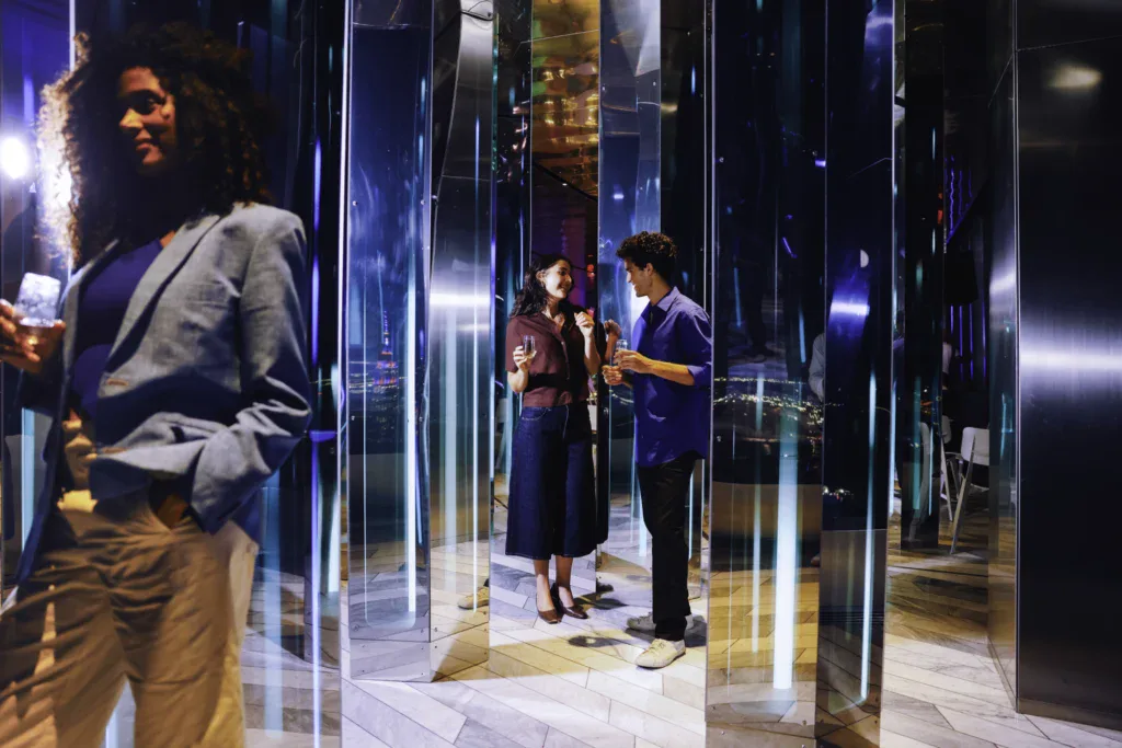 Edge NYC Indoor Attraction with Visitors - Edge NYC - Edge NYC Visitors enjoying the immersive experience at Edge NYC in Hudson Yards.